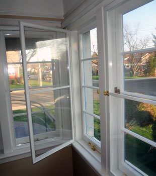 A basement window insulation panel installed on a home in Westport